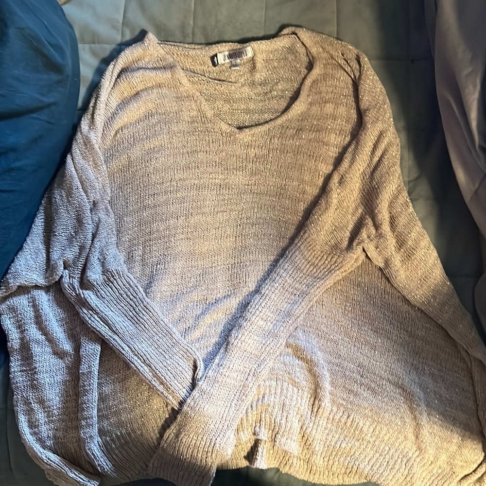 Jennifer Lopez size medium. Oversized shirt
